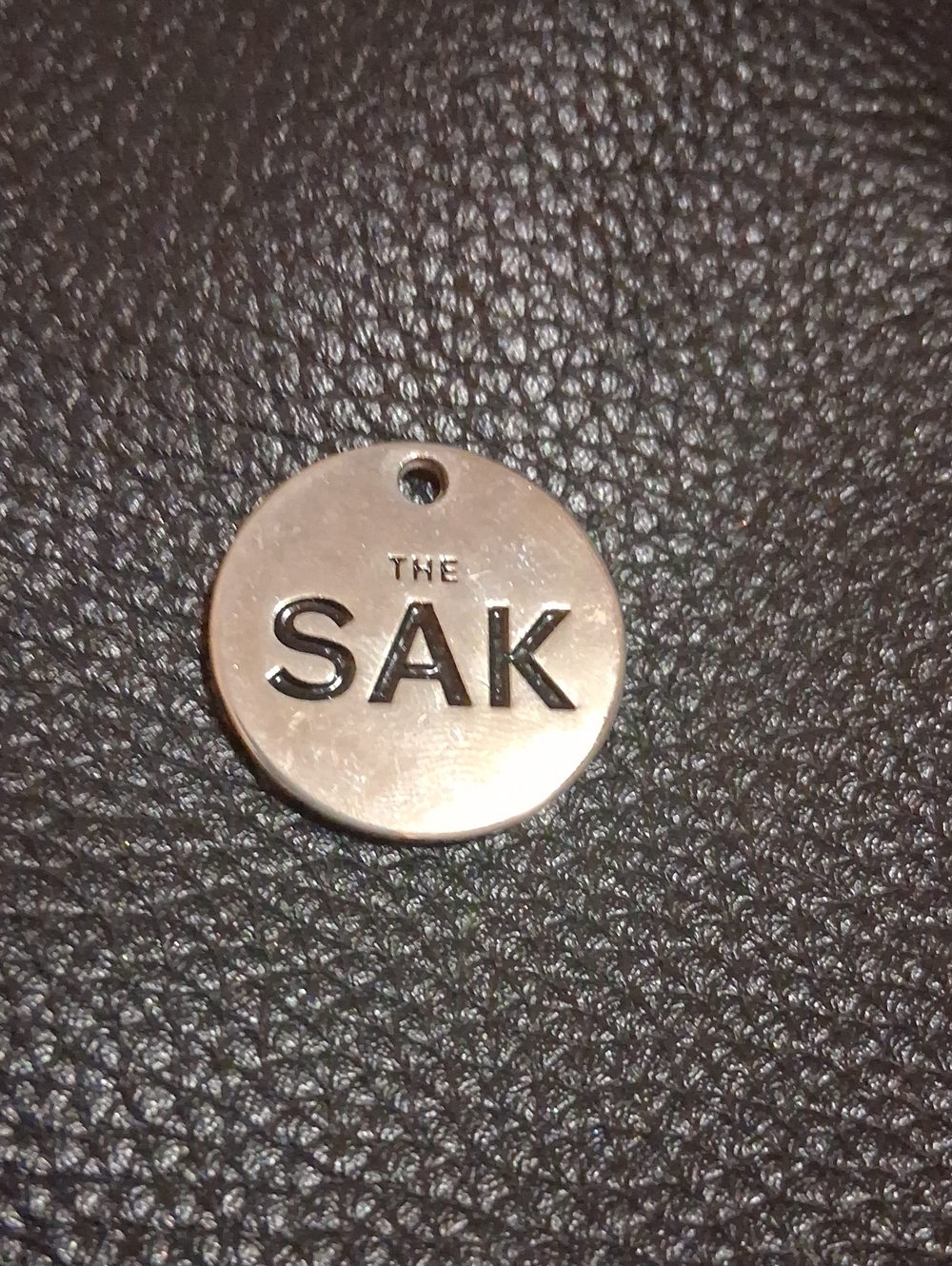 The Sak Silver Logo Pendant